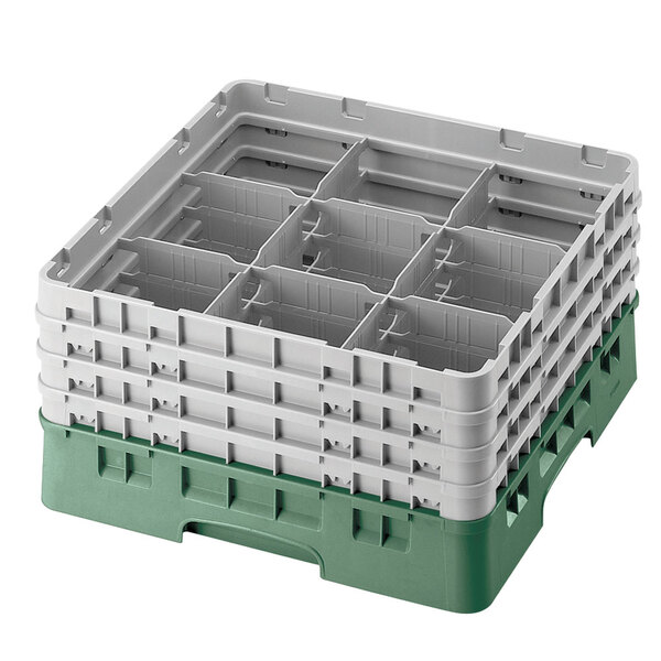 A white and green Cambro plastic glass rack with 9 compartments and 6 extenders.