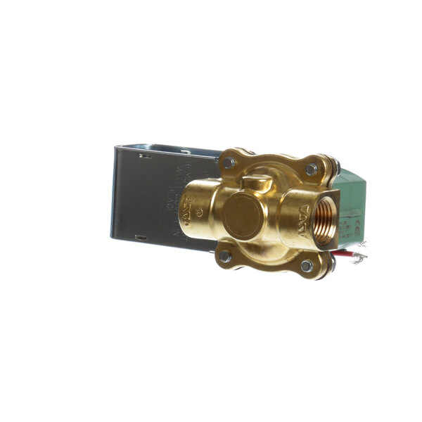 A close-up of a brass Salvajor solenoid valve with a gold cover.