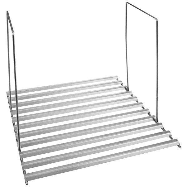 A metal platform with four metal bars on it.