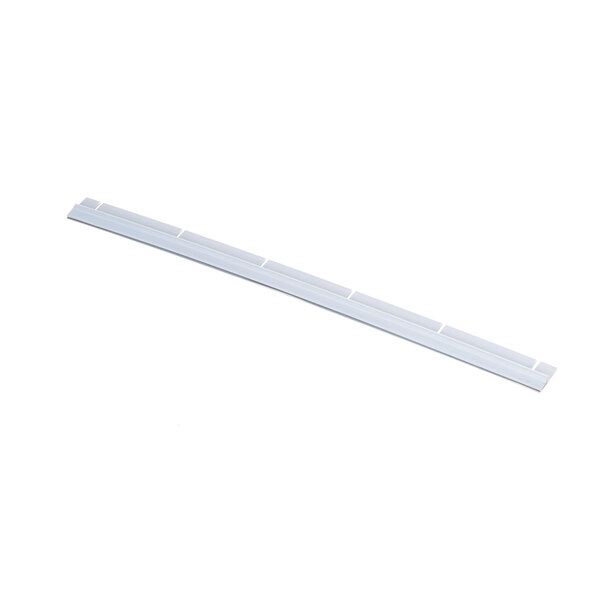 A white plastic strip with a white handle and a white rectangular object.