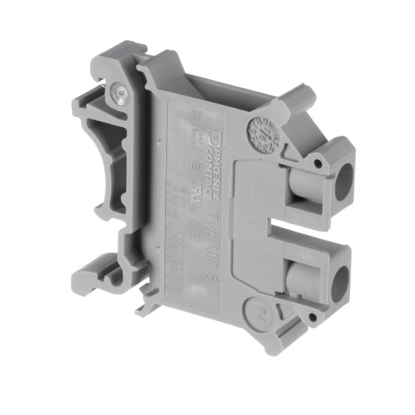 A gray plastic Giles term block with two holes.