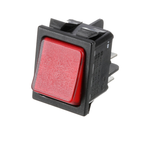A close-up of a Wilder red square button switch.