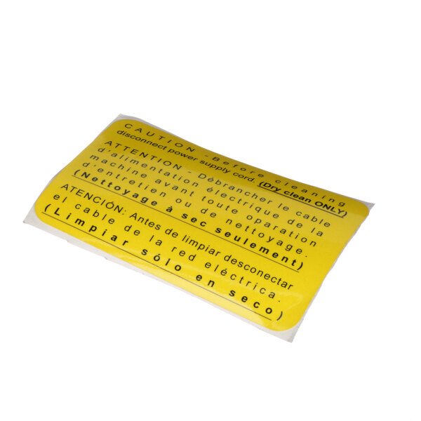 A yellow Doyon Baking Equipment label with black text.