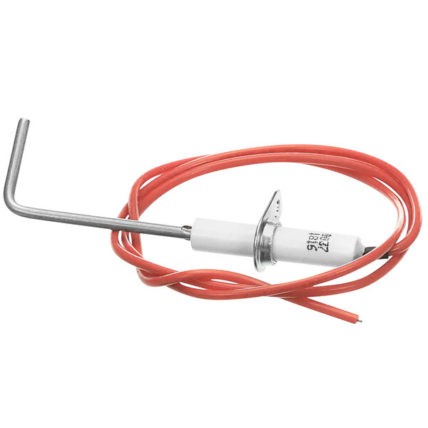 A Crown Steam spark electrode with a red plug and white wire.