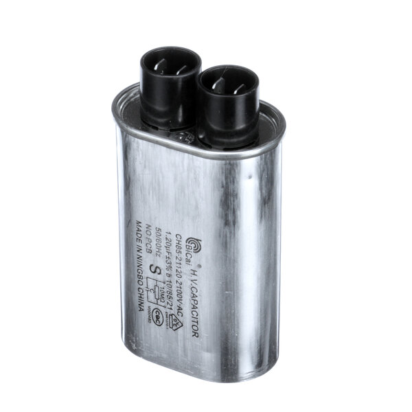 A silver metal Amana capacitor with black connectors.