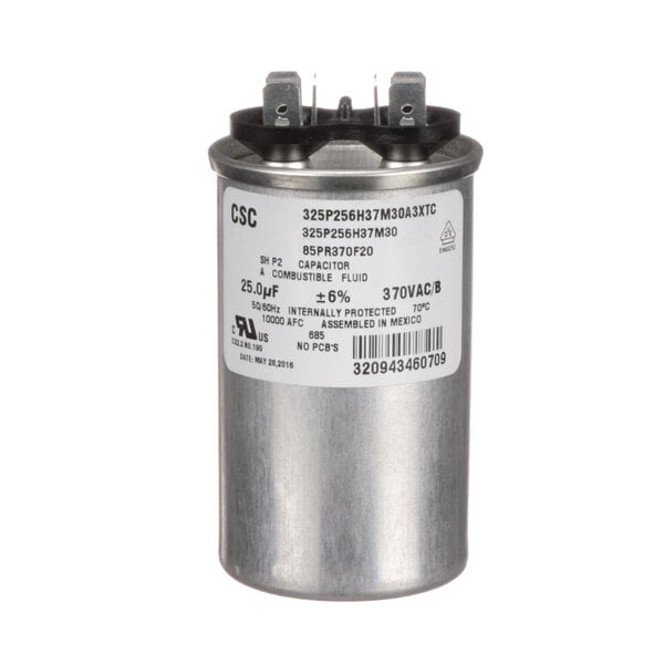 A round silver Grindmaster Cecilware run capacitor with a white label.
