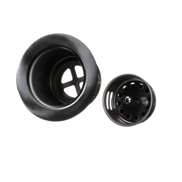 A black plastic Blakeslee drain elbow with a hole in it.