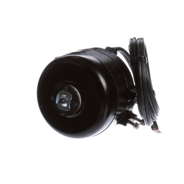 A black round motor with a wire attached.