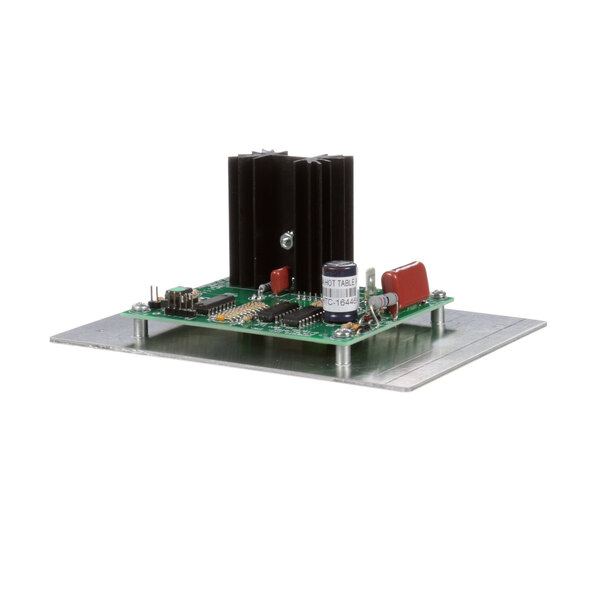 A green Barker Control Board with black and red electronic components.