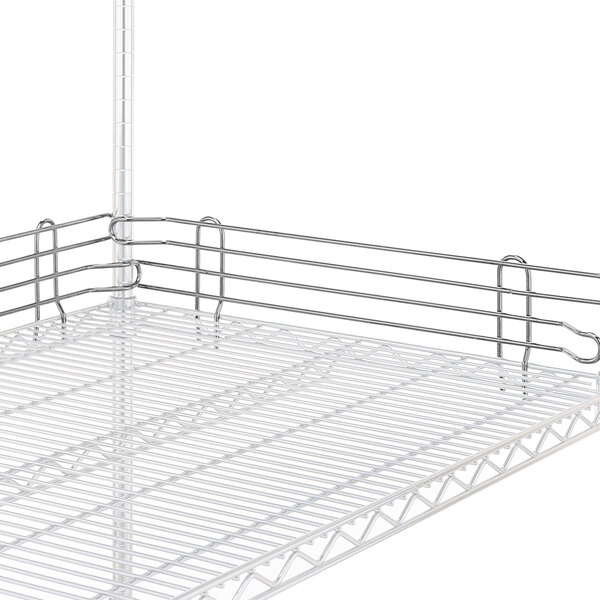 A close-up of a stainless steel Metro L18N-4S stackable ledge on a wire shelf.