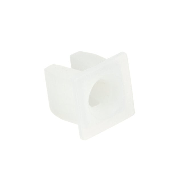 A close-up of a white plastic square grommet.