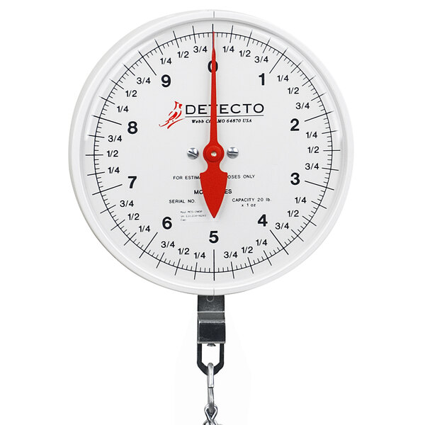 A Cardinal Detecto hanging scale with a white scale and red hand and chain.