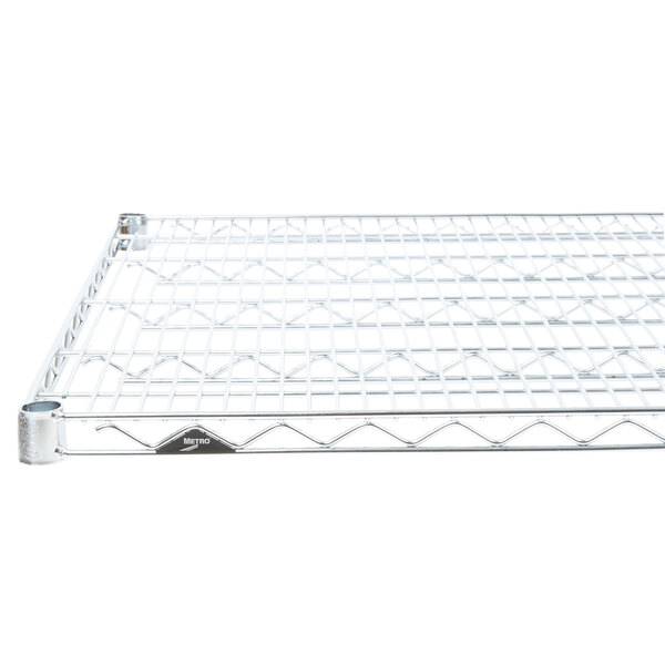A Metro Super Erecta wire shelf with a chrome metal frame and grid with holes.