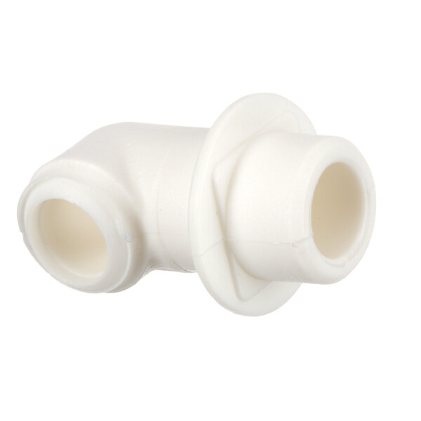 A close-up of a white plastic pipe fitting.
