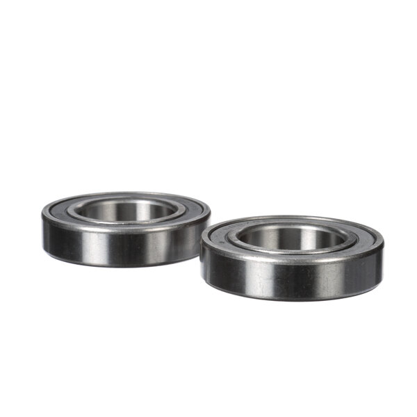 A pair of Zumex metal bearings.