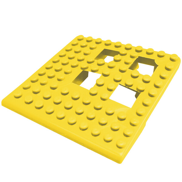 A yellow Cactus Mat Dri-Dek interlocking corner piece with holes.