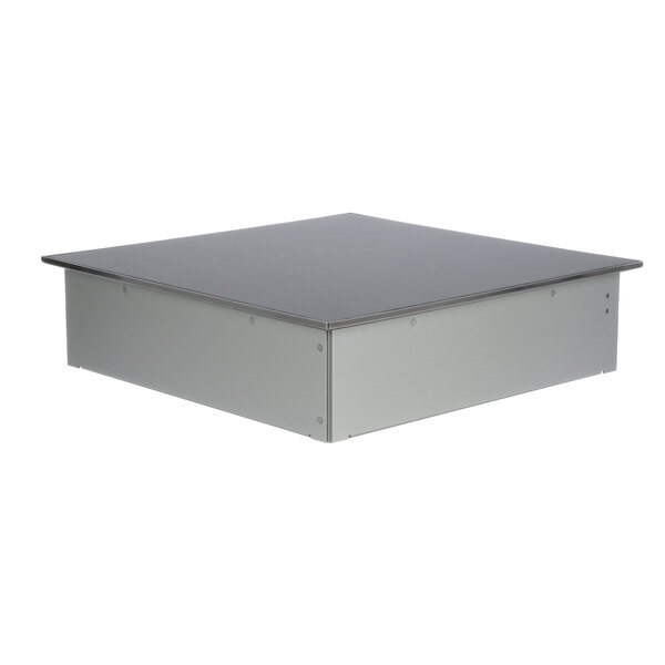 The top housing for a CookTek single cooktop, a grey rectangular box with a black lid.