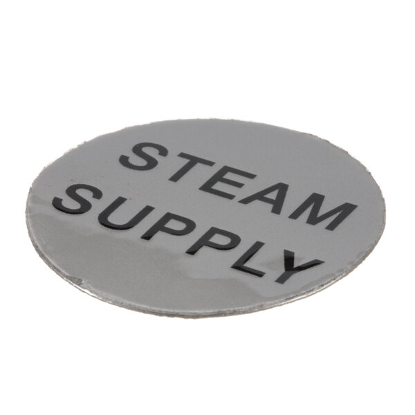 A round silver metal decal with a black and white steam supply logo.