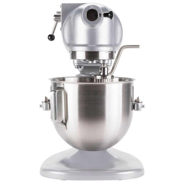 A silver Hobart N50 countertop mixer with standard accessories.