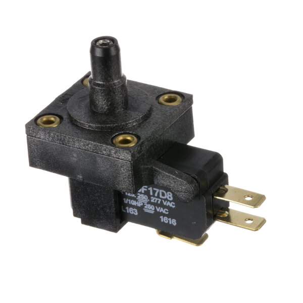 A close-up of a black Jackson Pressure Switch with a round black knob and gold wire.