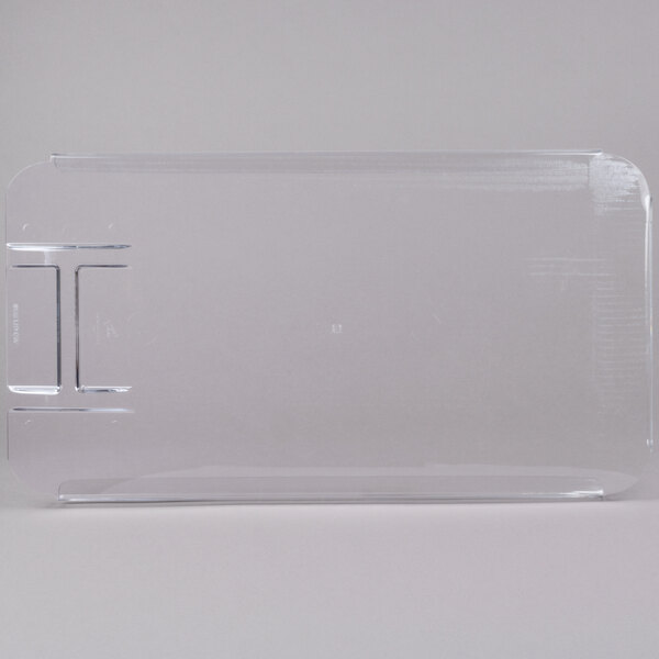 A clear plastic lid with a white border and a metal handle.