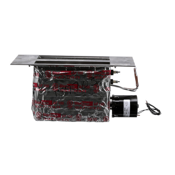 A black A la Cart heating assembly with wires and a power cord in a plastic bag with red text.