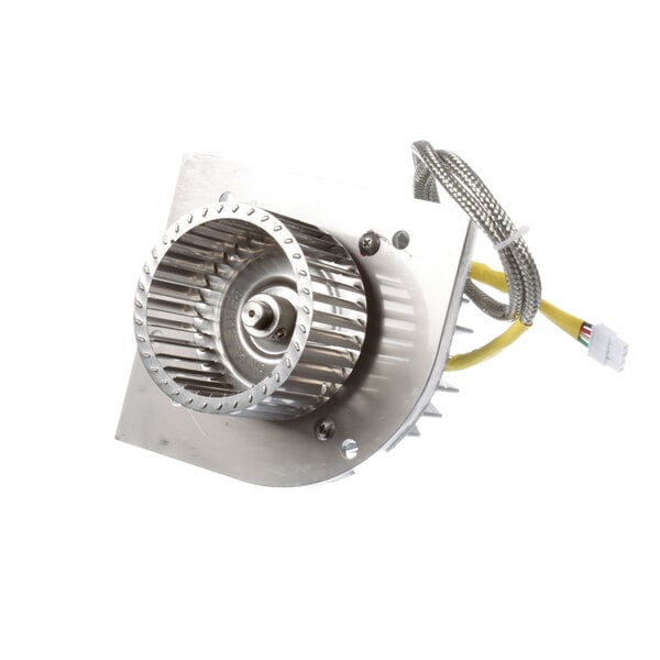 A metal TurboChef blower motor fan with wires.