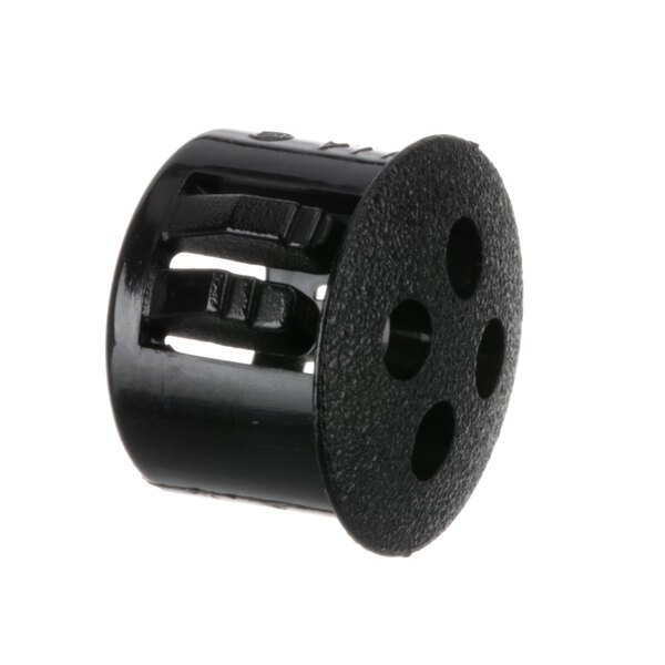 A black plastic Edlund plug with holes.