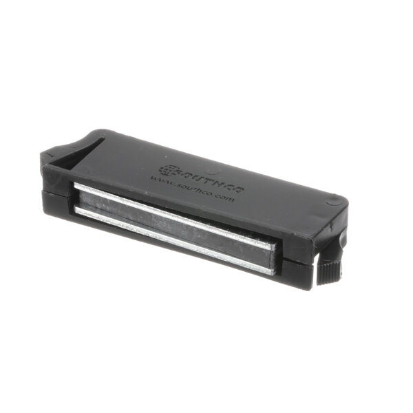 A black plastic Carter-Hoffmann magnetic catch with a metal strip.