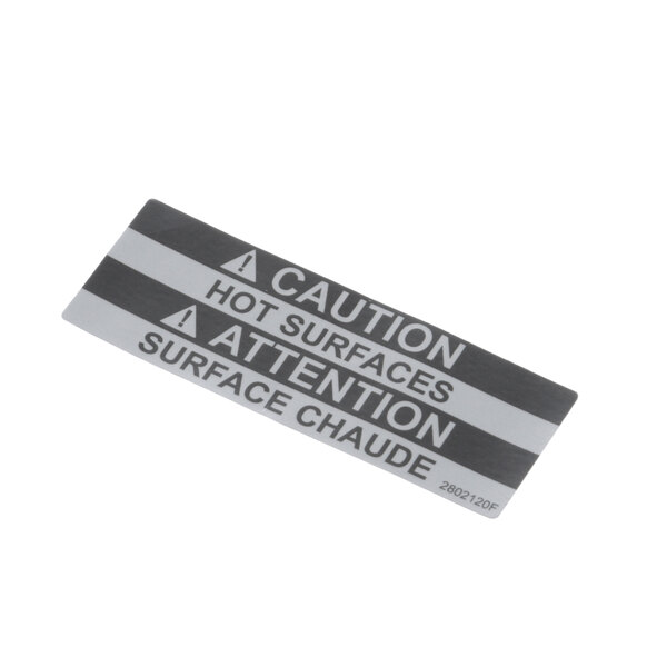 A close-up of a Lincoln caution label with the words "Caution Hot"