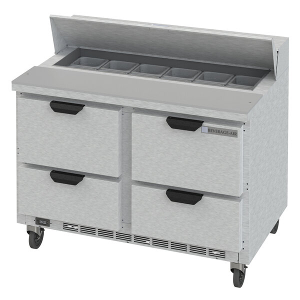 A white commercial refrigerated sandwich prep table with 4 drawers.