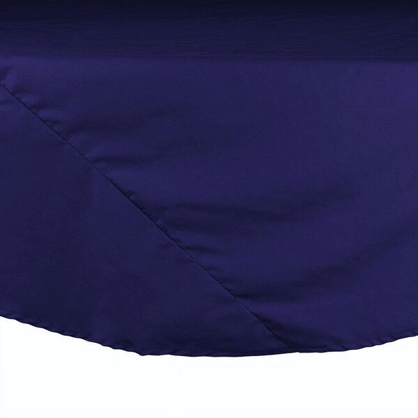 An Intedge navy blue poly/cotton blend round table cloth on a table.