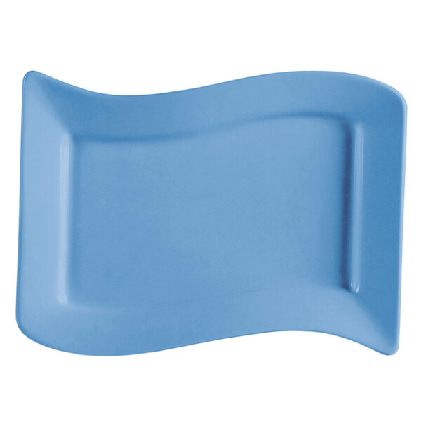 A light blue rectangular stoneware platter with a curved edge.