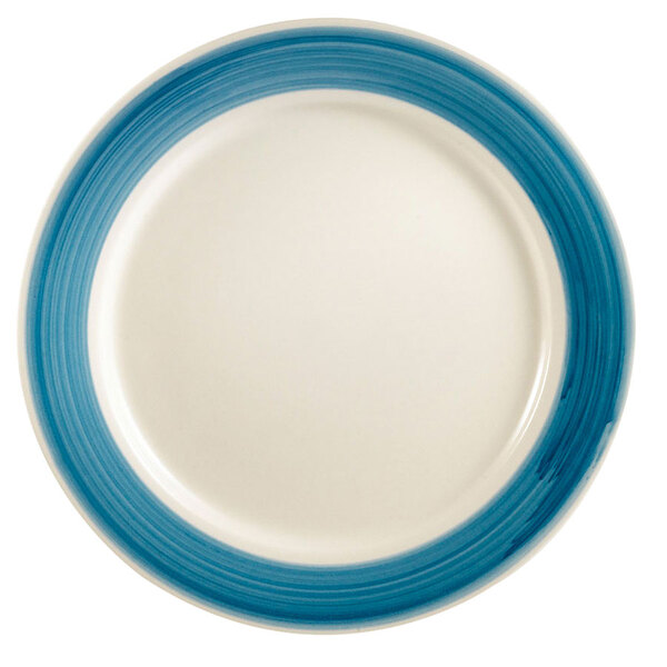 A white plate with blue stripes on it.