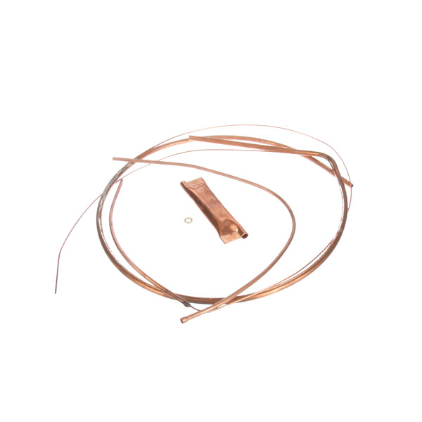 A close-up of a copper cap tube assembly with a copper wire.