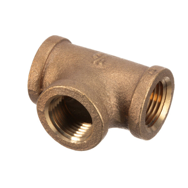 A close-up of a brass Hobart tee pipe fitting.