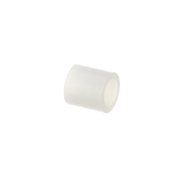 A white plastic tube with a black circle.