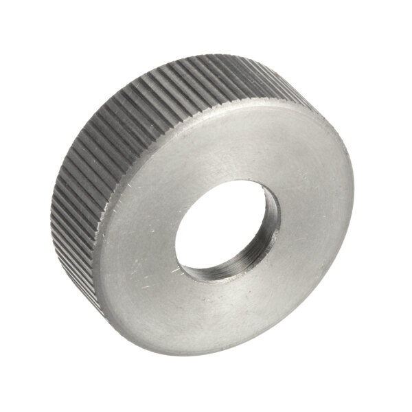 A stainless steel APW Wyott retaining nut with a hole in it.