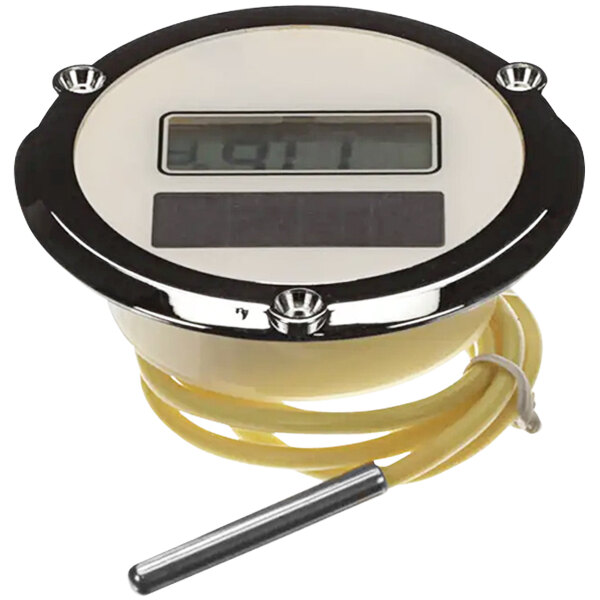 A H&K International digital thermometer with a yellow cable and silver rim.