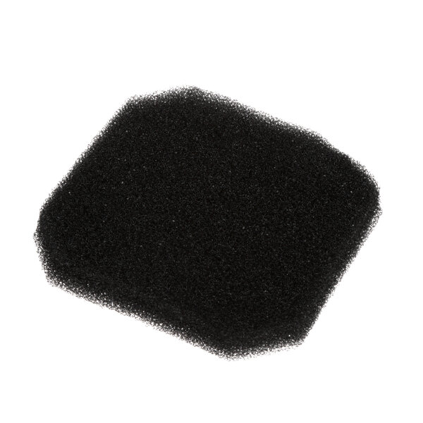 A black sponge with a foamy texture.