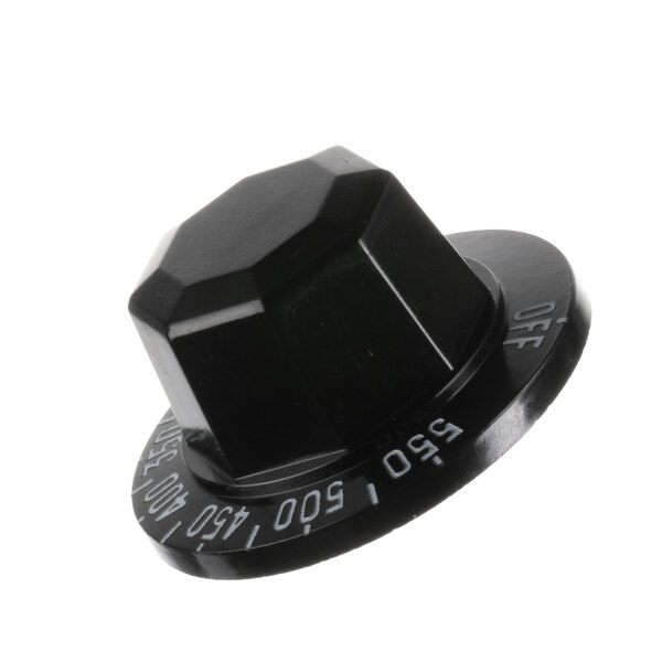 A black plastic Imperial range thermostat dial with white text.