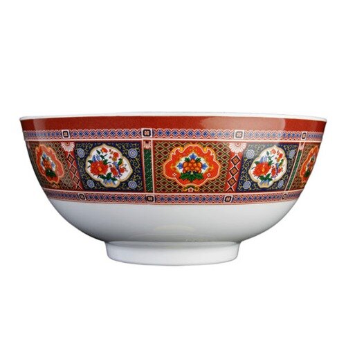 A close-up of a Thunder Group Peacock melamine bowl with a red and orange flower design.