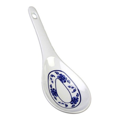 A white spoon with a blue lotus design on the handle.