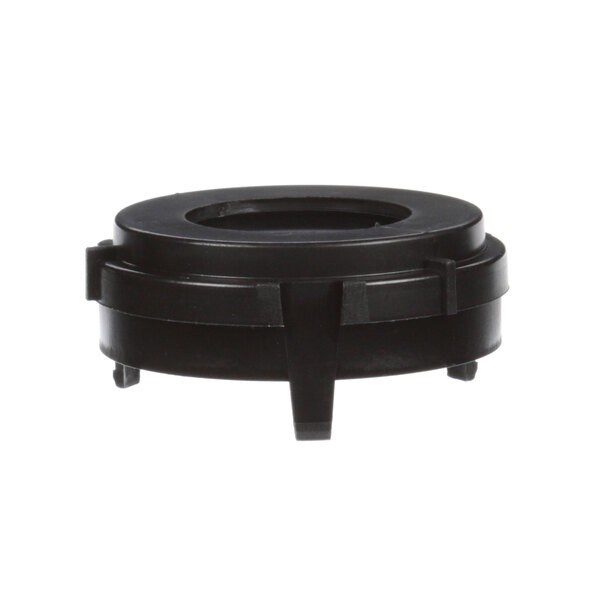 A black plastic Robot Coupe duct with a round lid.