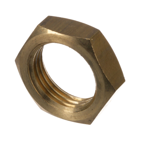 A close-up of a brass hex nut with a hexagonal shape.