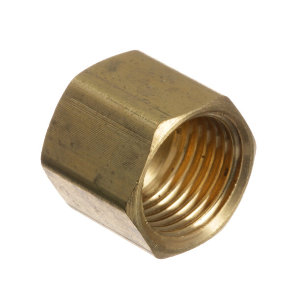 A close-up of a brass threaded nut.
