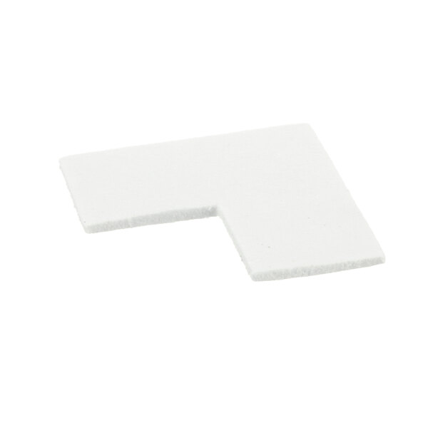 A white foam pad with a corner.