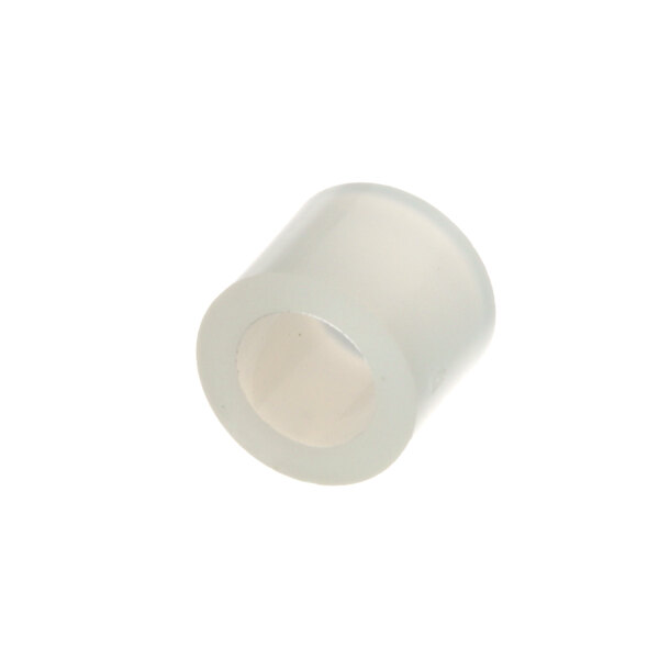 A white plastic tube with a small hole in it.