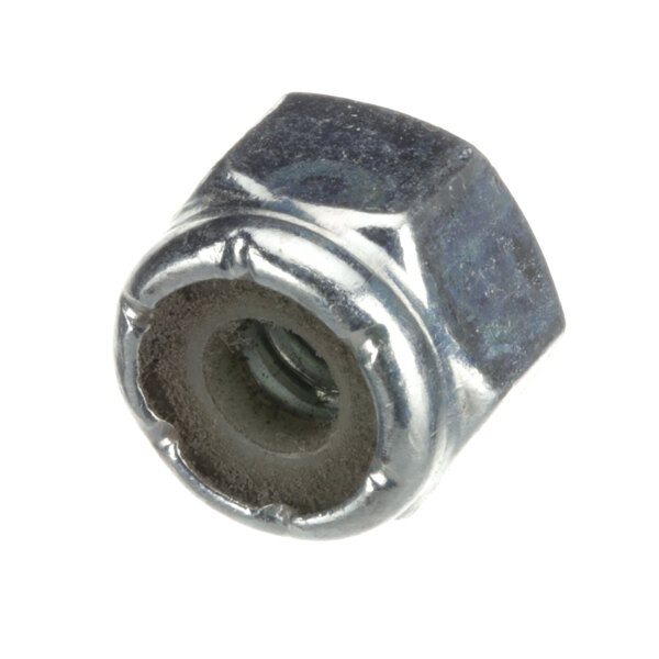A close-up of a Vulcan nut with a metal cap.
