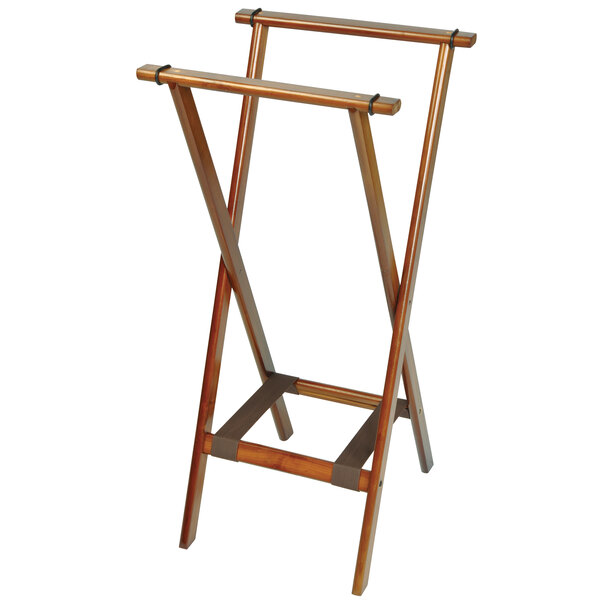 A dark walnut wooden tray stand with two legs and a handle.